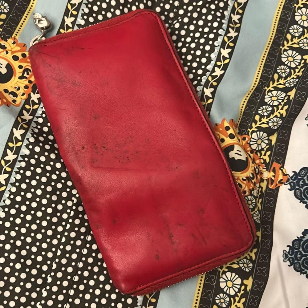 Alexander McQueen Red Long zip around wallet with skull tab.